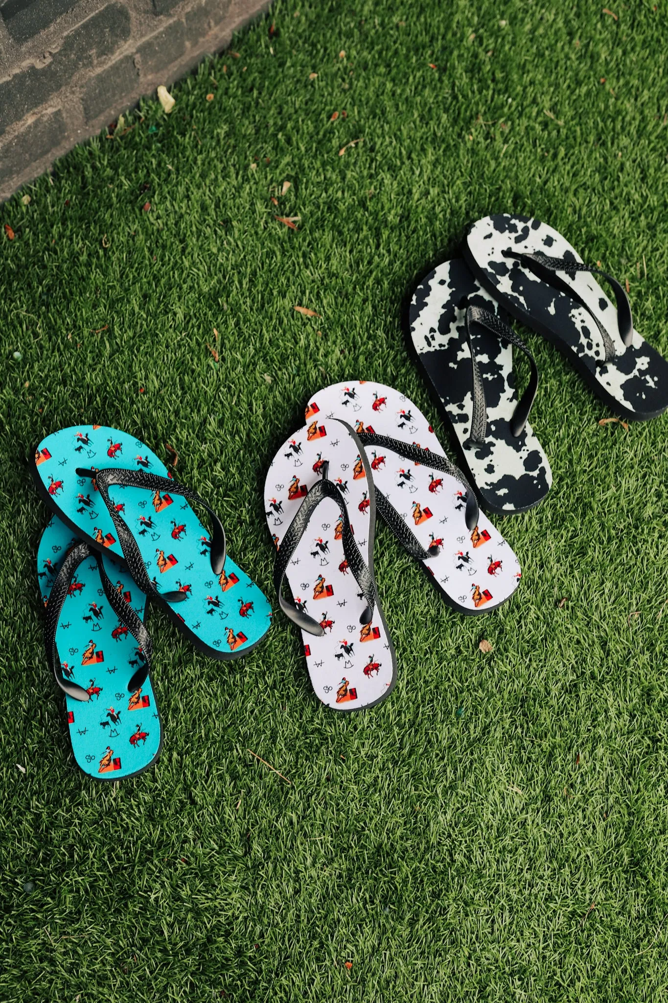 Black Cowhide Print Flip Flops